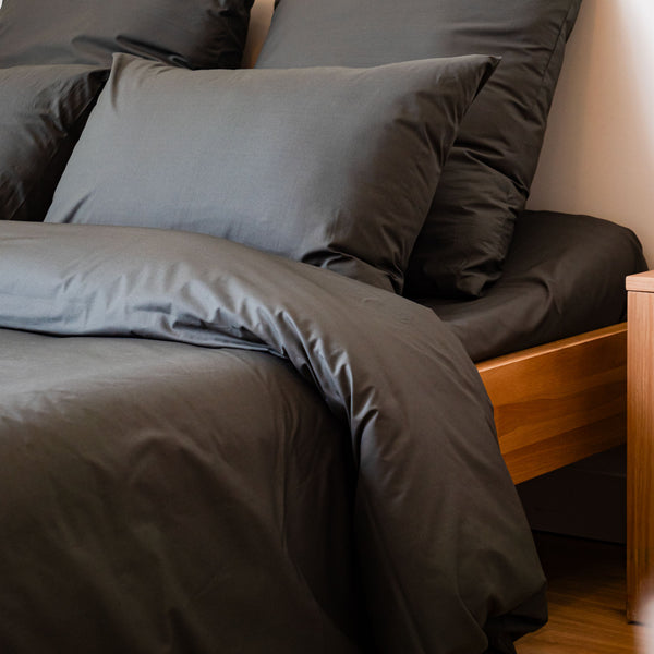 Dejorine - Taie de traversin en Percale de Coton - Teinte Coeur d'ébène - Couleur Gris Anthracite